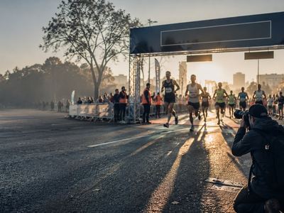 Runners approaching the finish line at a city marathon