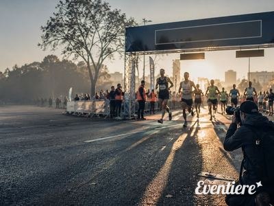 Runners approaching the finish line at a city marathon